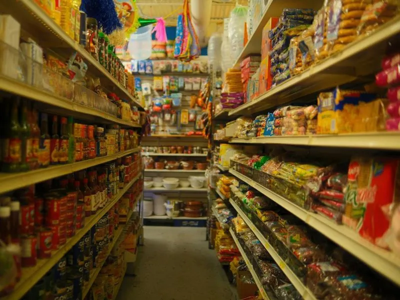 A grocery aisle stocked with packaged food