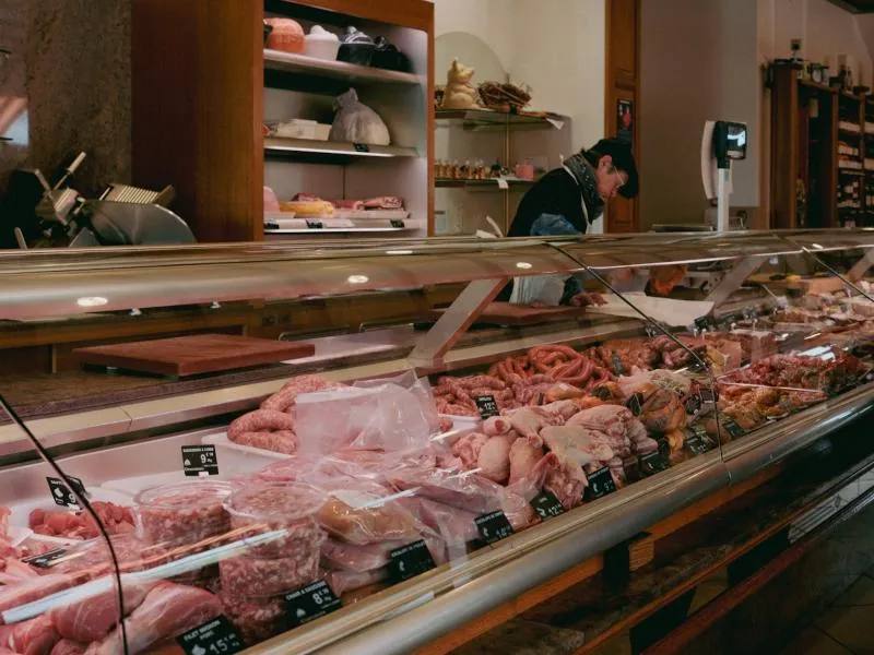 A butcher counter with fresh cuts on display